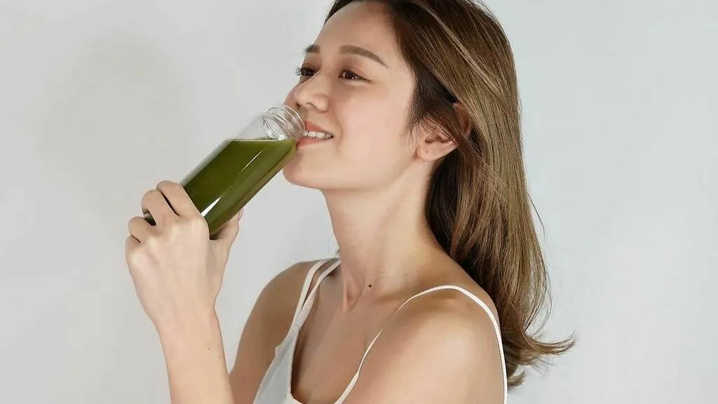 Woman Drinking Future Salad